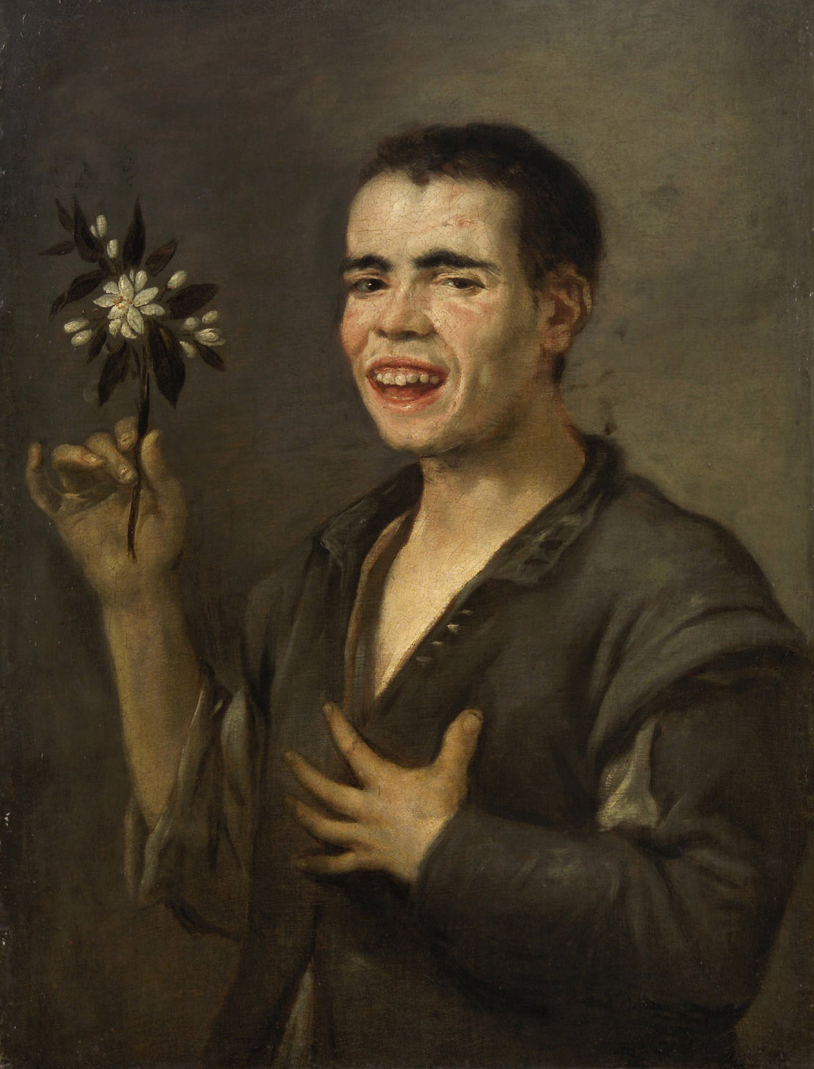 Laughing lad with orange blossom